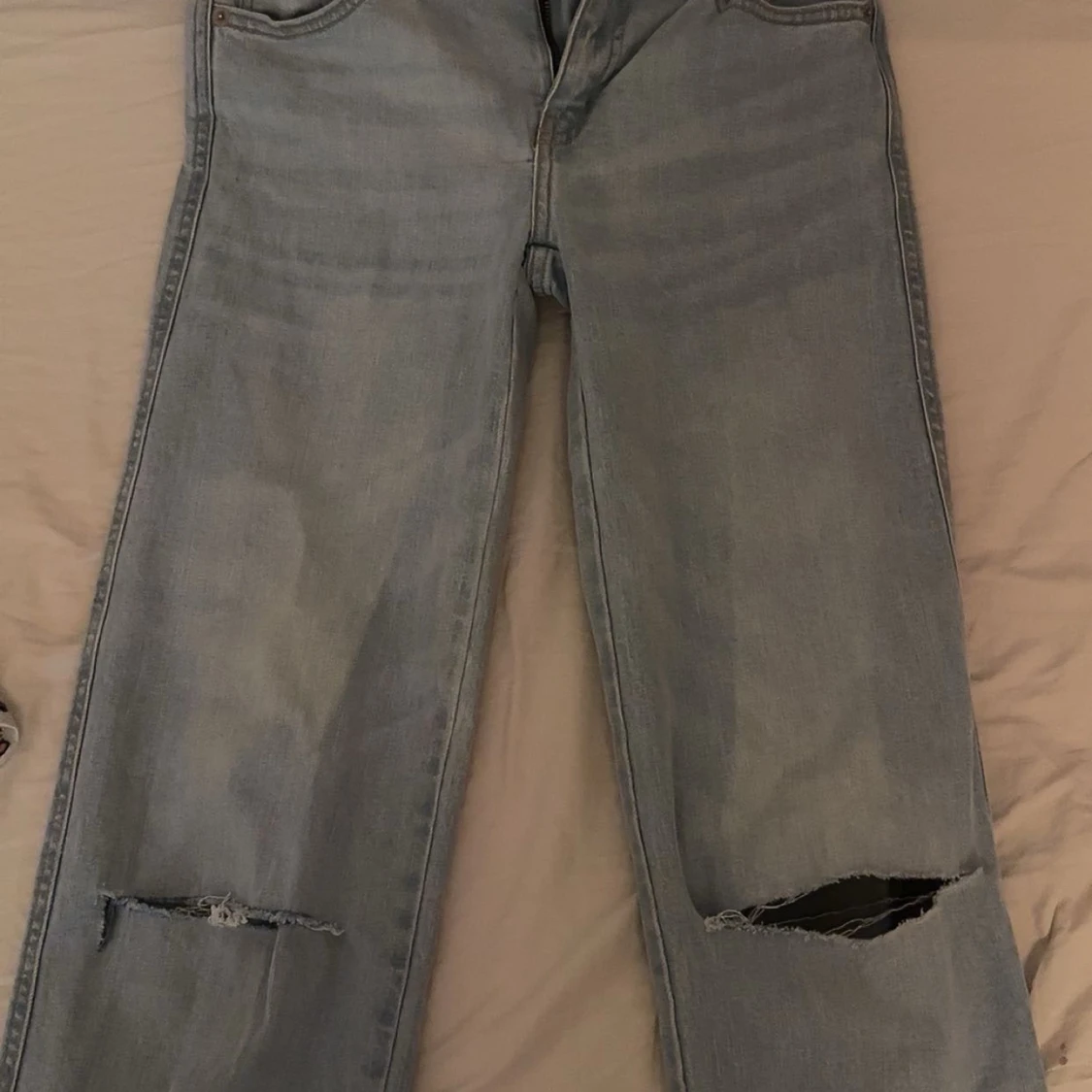 Ljusblå jeans med hål från 157 - 1