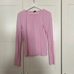 Rosa långärmad tröja - Knappt använd
