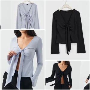 Två Toppar med knytning - Trendig långärmad topp med djup v-ringning och knyt framtill. Finns i ljusblått och svart. Toppens material är mjukt och stretchigt. Aldrig använt💕