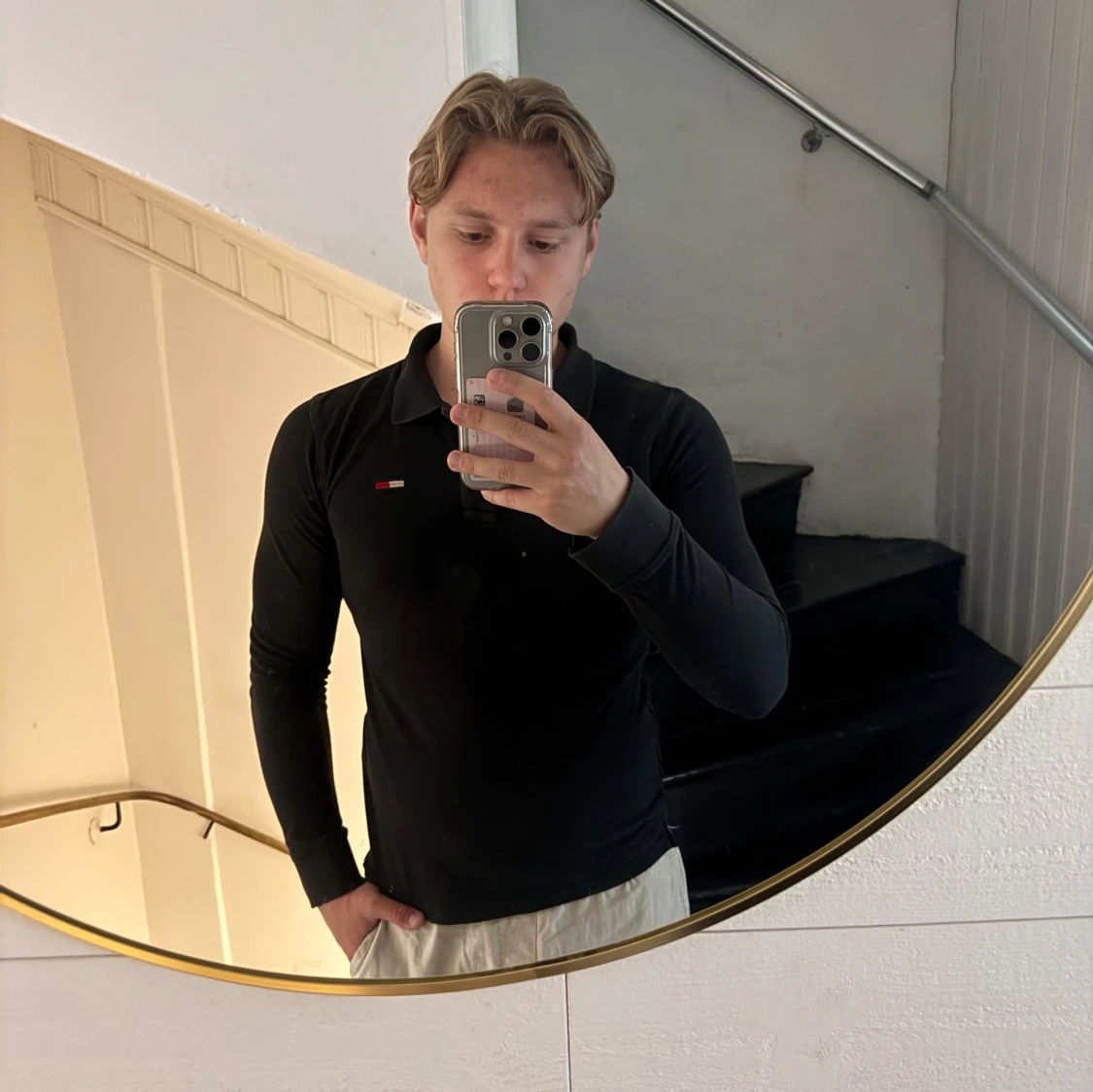 Svart pikétröja från Tommy Hilfiger