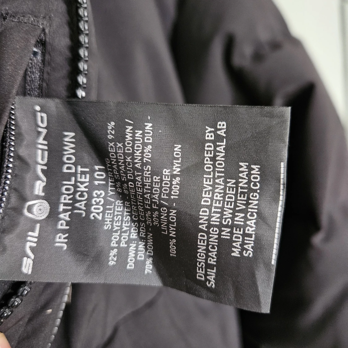 Svart dunjacka från Sail Racing - 2