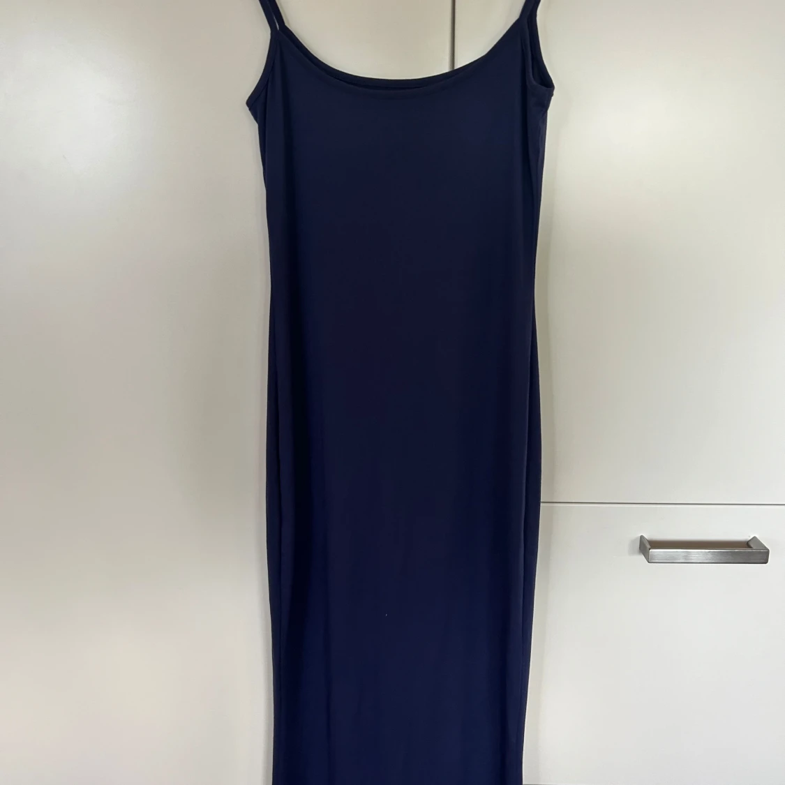 Mörk blå klänning