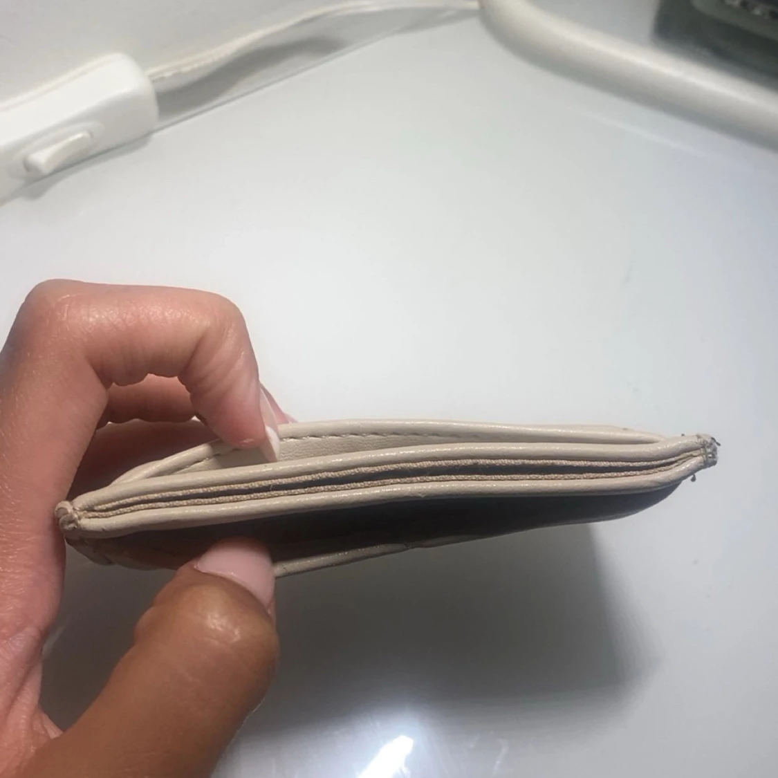 Beige quiltad plånbok i skinn - 1