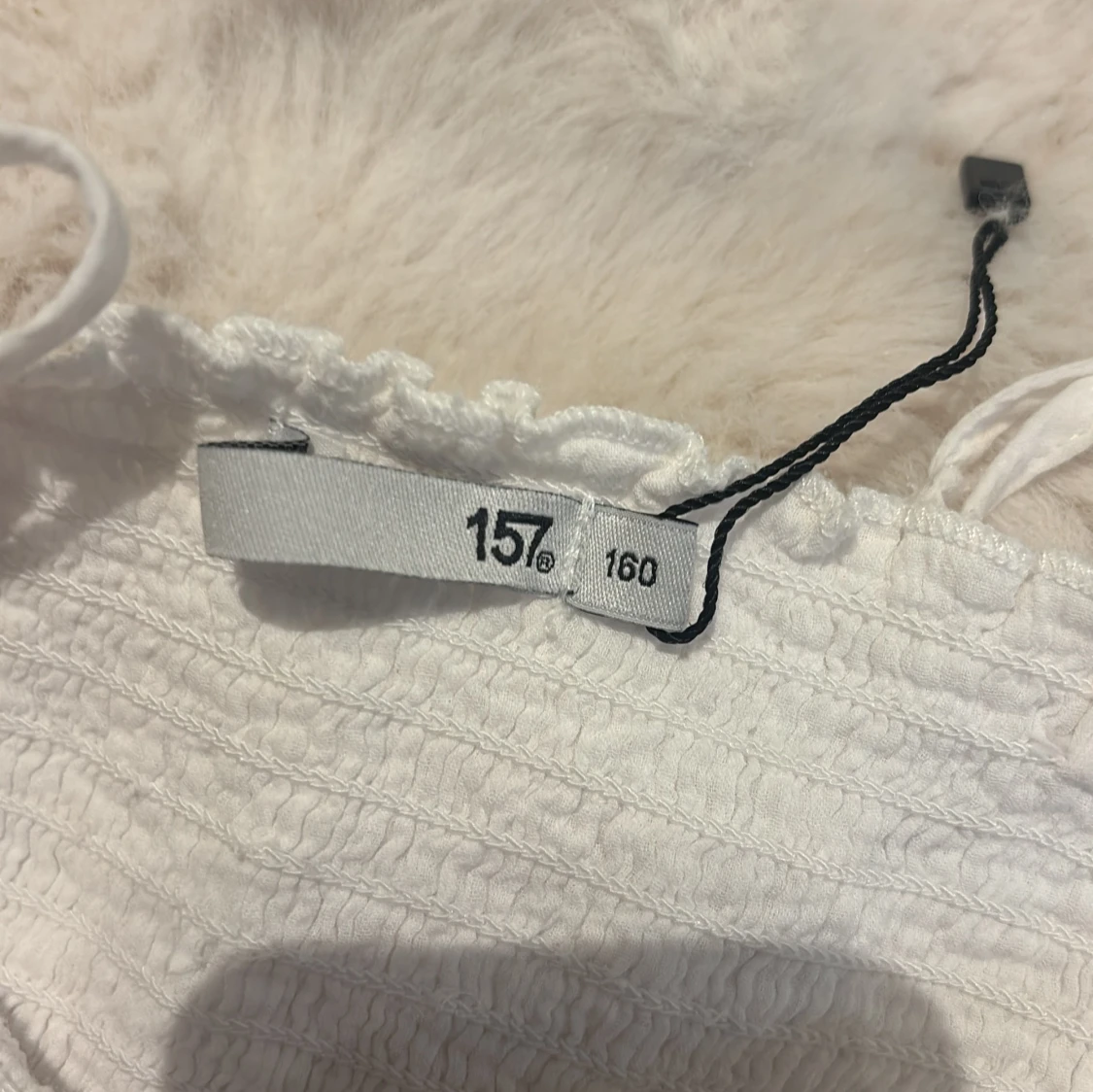 Vit somrigt linne - 1