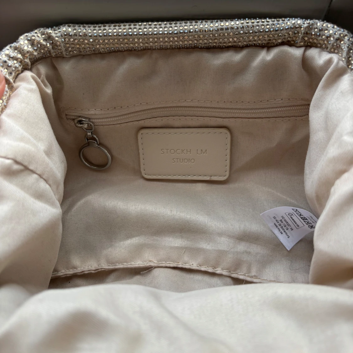 Glittrig kuvertväska från STOCKH LM Studio - 1