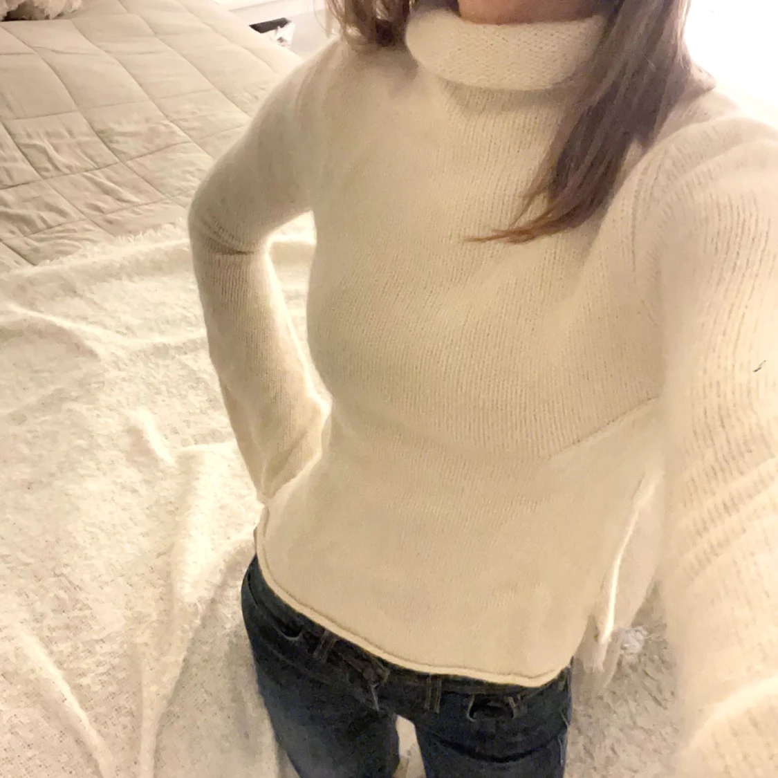 Snygg stickad polotröja från sand!