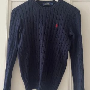 Ralph lauren - Kabelstickad Ralph lauren strl S.  Använd fåtal gånger 