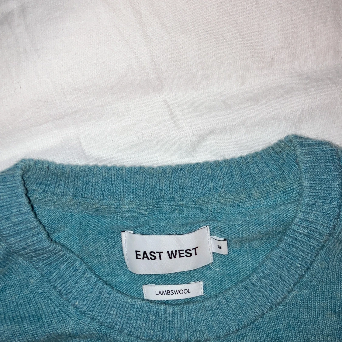 Stickad tröja från EAST WEST - 90