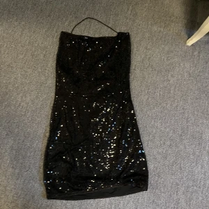 Paljett klänning  - Oanvänd paljett klänning, perfekt för fester