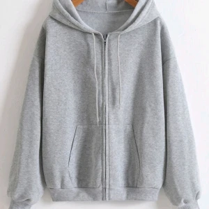 Grå zipup hoodie - Zipup hoodie ifrån shein som inte kommit till användning (nyskick). Den är lång och oversized