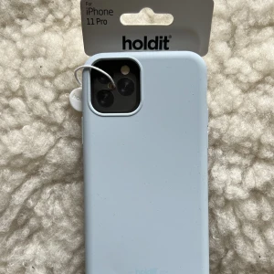 Holdit mobilskal - Helt nytt mobilskal från Holdit i en fin ljusblå färg! Passad IPhone 11 PRO. 