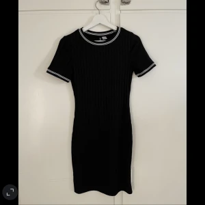 Klänning  - Figurklänning 