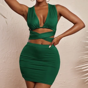 Grön klänning i strl XS - Grön klänning i topp&kjol set, strl XS. Stretchigt material och passar även strl S. Använd 1 gång.