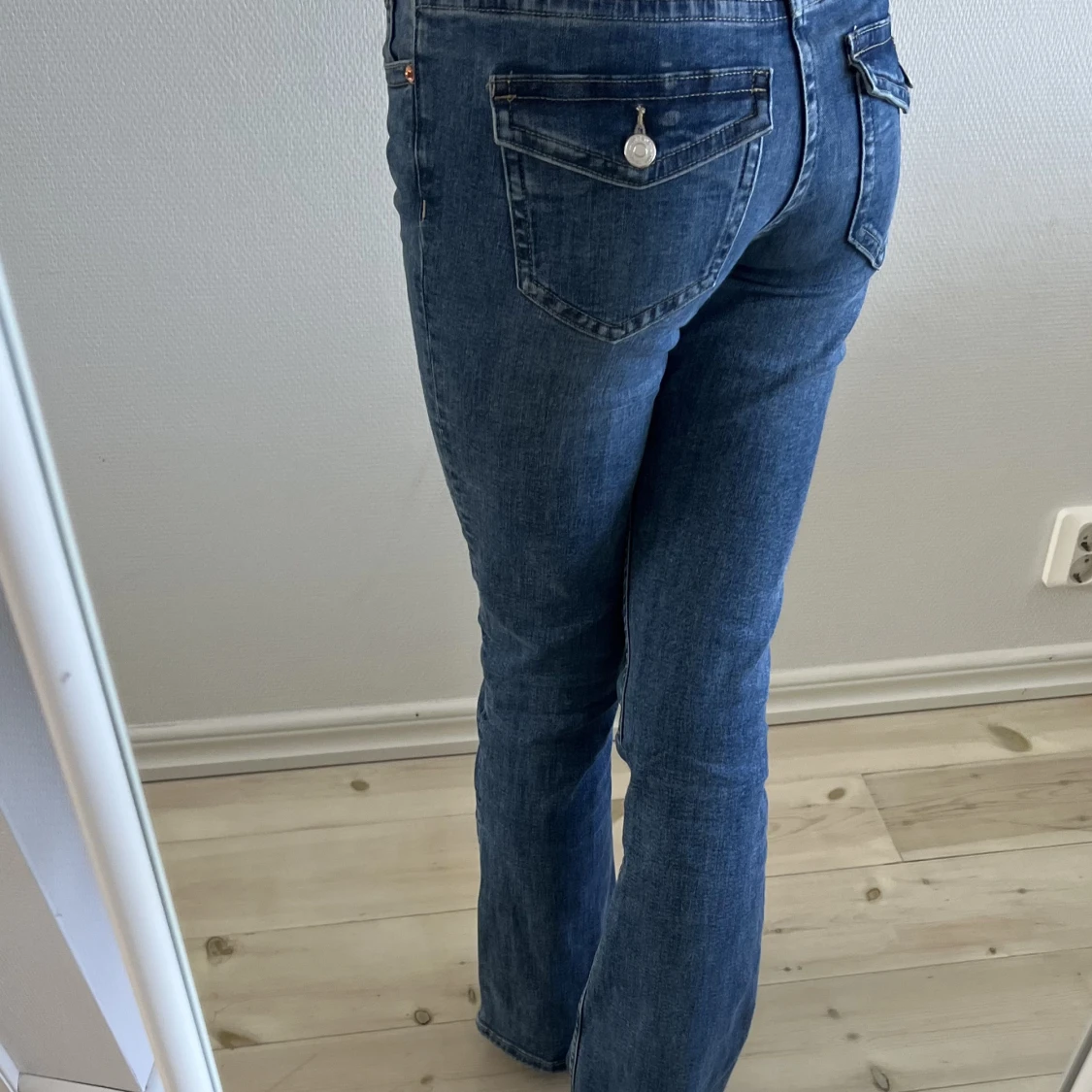 Lågmidjade jeans med vintage fickor - 90