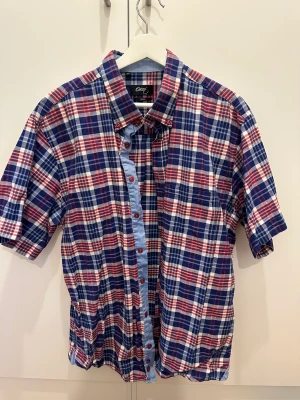 Skjorta Oscar Jacobsen  - L/XL  Rutig/randig