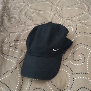 Nike keps - Svart nike keps. Bra skick.