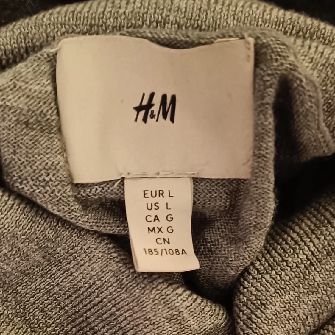 Grå turtleneck  - 91