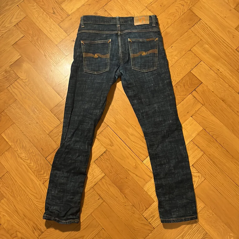 Nudie jeans i modellen Grim tim Storlek 32W30L. Jeans & Byxor.
