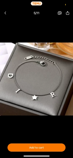 Armband/fotledsband - Helt nytt!! jag har ett själv som jag använder som armband, man kan ställa in storleken.  (Detta är inte äkta dior)  Frakt 11kr