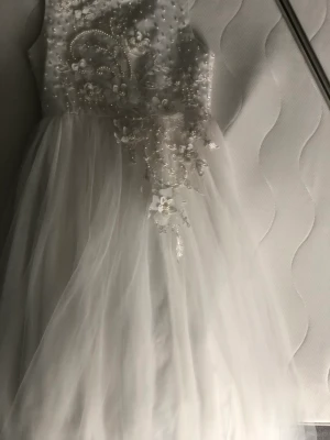 En festkläning  - Den har jag använd 1 gång den är ny