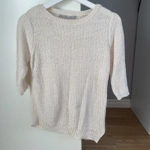 Stickad t-shirt - Okänt märke