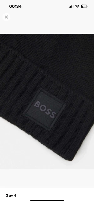 Mössa från Boss - näst intill oanvänd mössa från Hugo Boss 