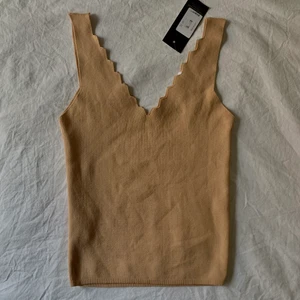 Linne - Linne som har fin urringning fram och i ryggen. 