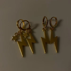 Smycken - Aldrig använda smycken!   Dom guldiga blixtrarna finns även i silver.     Halsbandet 70kr. Armband 60kr. Örhängen 60kr                                                           Säljer då jag har ett eget UF företag där jag tillverkar smycken! På instagram heter jag EmJewelry UF om ni är intresserade kan ni kolla där!