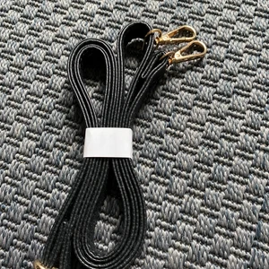 Väskband - Guld och svart. Aldrig använt. Justerbart 