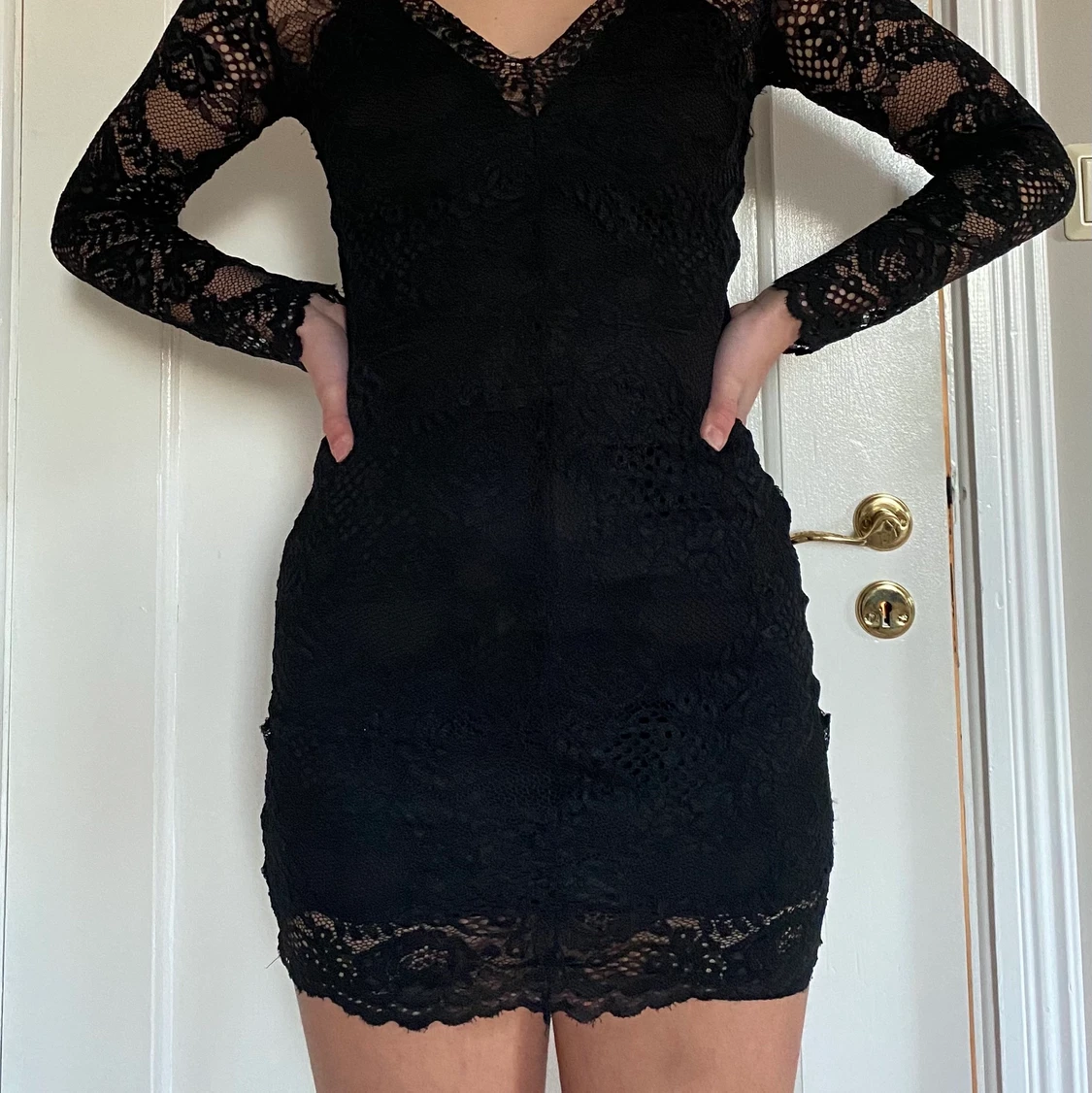 Svart spetsklänning
