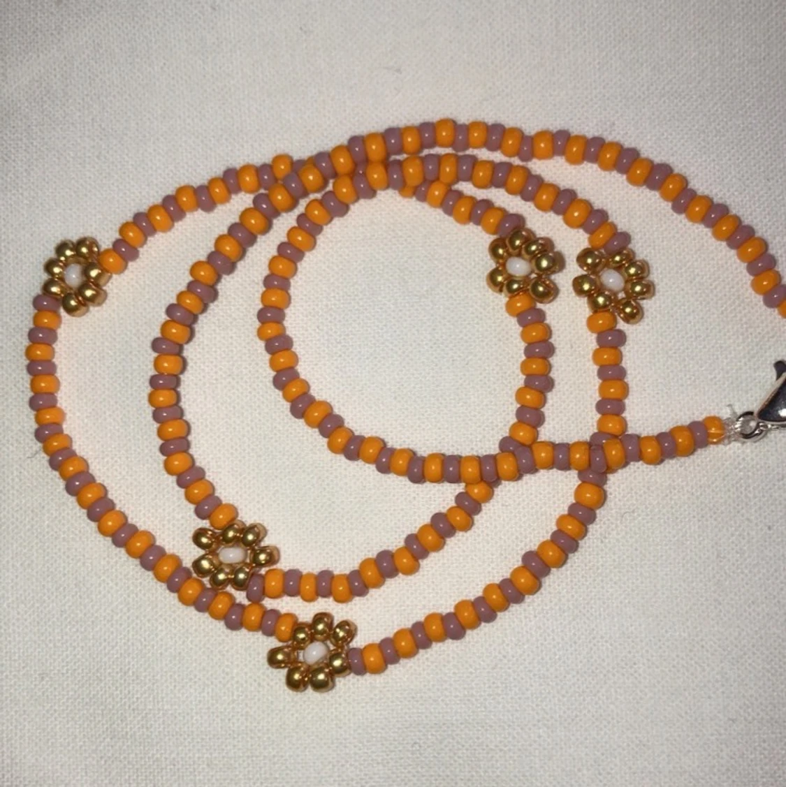 Halsband blommor - 91