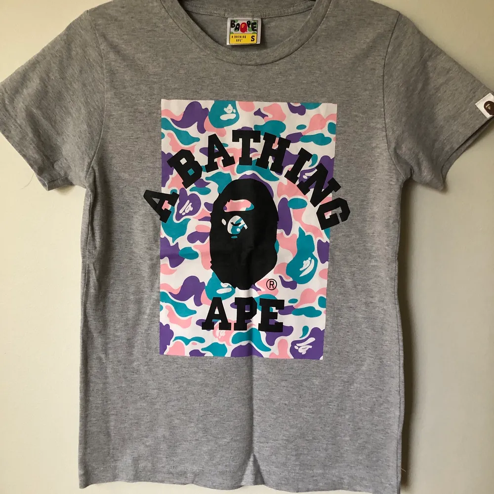 Women’s Bape / A Bathing Ape Classic Camo T-Shirt  Size small, women’s fit.  Great condition, no flaws or damage.  DM if you need exact size measurements.   Buyer pays for all shipping costs. All items sent with tracking number.   No swaps, no trades, no offers. . T-shirts.