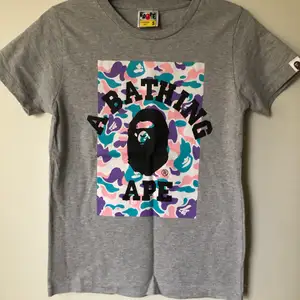 Women’s Bape / A Bathing Ape Classic Camo T-Shirt  Size small, women’s fit.  Great condition, no flaws or damage.  DM if you need exact size measurements.   Buyer pays for all shipping costs. All items sent with tracking number.   No swaps, no trades, no offers. 