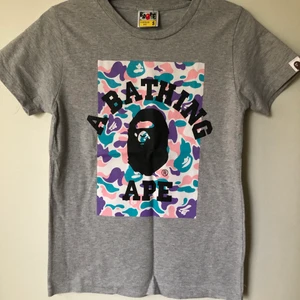 Women’s Bape Classic Camo Tee - Women’s Bape / A Bathing Ape Classic Camo T-Shirt  Size small, women’s fit.  Great condition, no flaws or damage.  DM if you need exact size measurements.   Buyer pays for all shipping costs. All items sent with tracking number.   No swaps, no trades, no offers. 