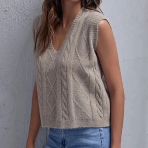 Mjuk väst  - Helt ny väst i en superfin grå-brun färg! 