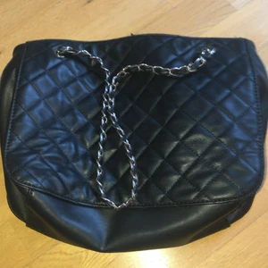 En ny handväska - Oanvänd 