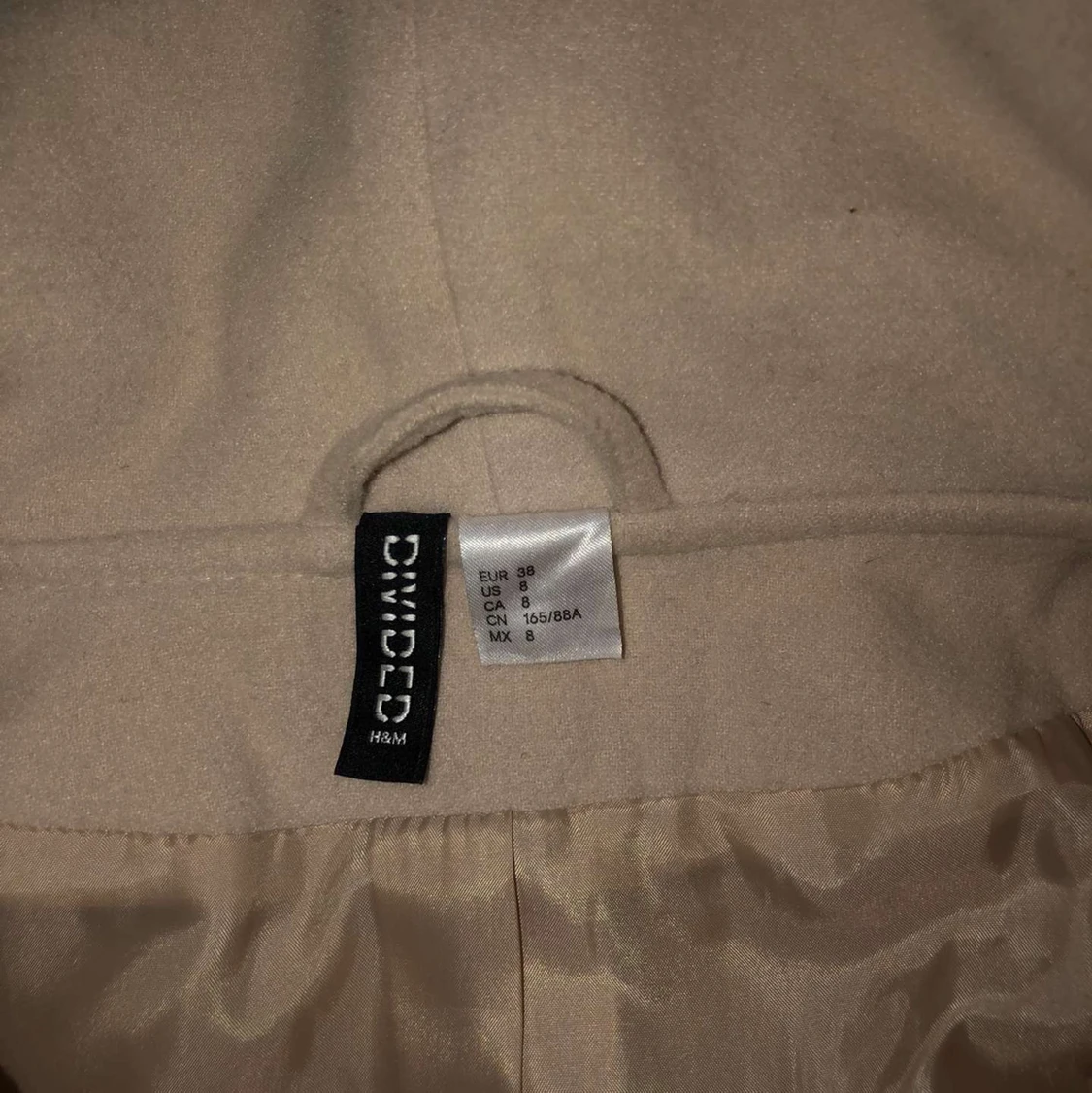 Oanvänd kappa från H&M  - 90
