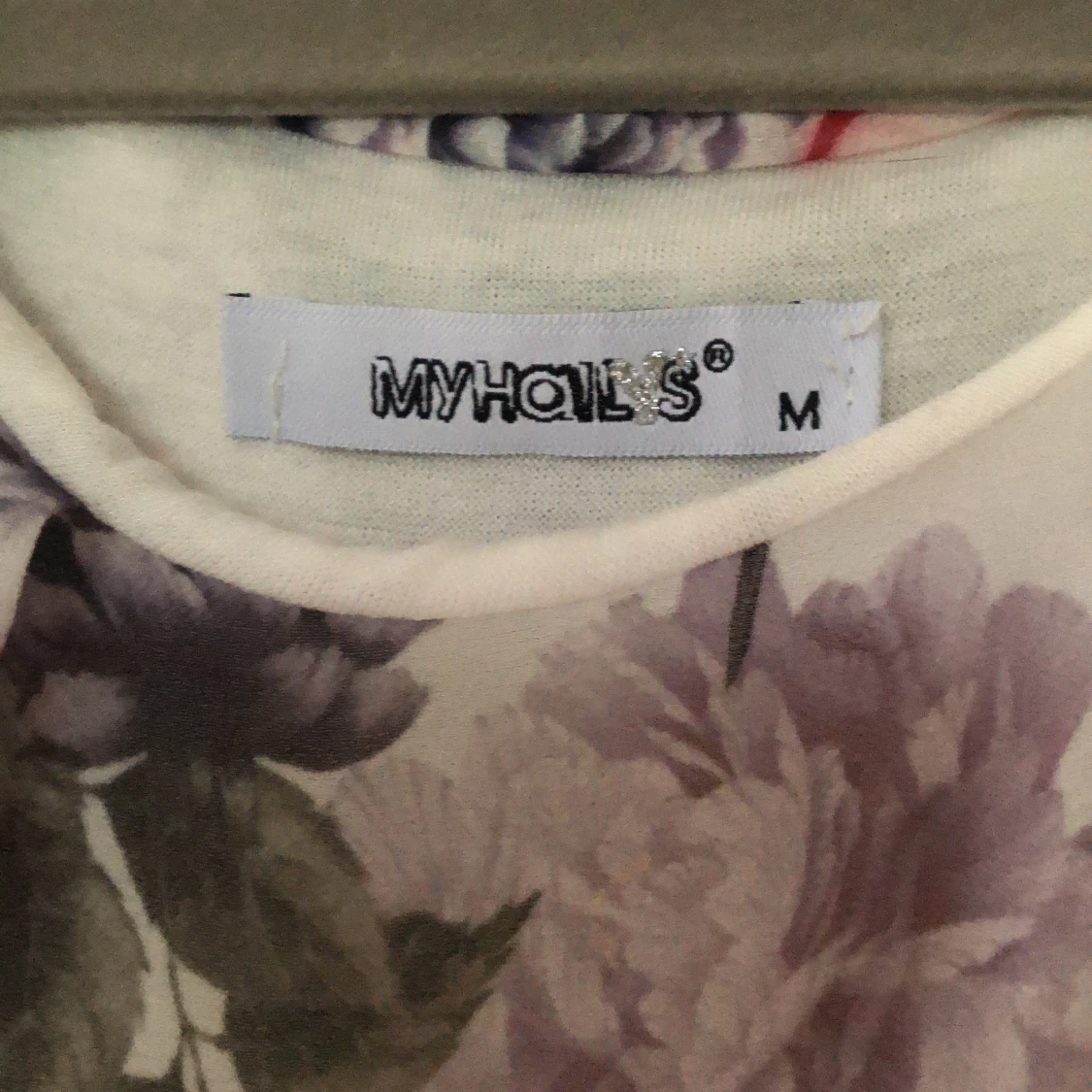 Blommig klänning strl M - 91