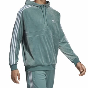 Adidas set, strl L - Turkos/grönt Adidasset i velour, storlek L. Använt ett par gånger. Hoodie med dragkedja vid kragen och raka byxor (utan resår vid anklarna). Köpt i herrbutiken Volt. 