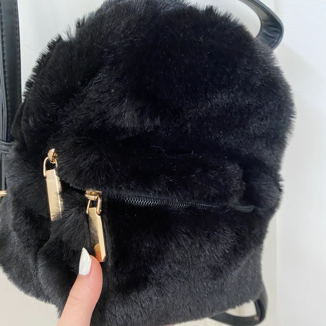 Fluffig miniryggsäck