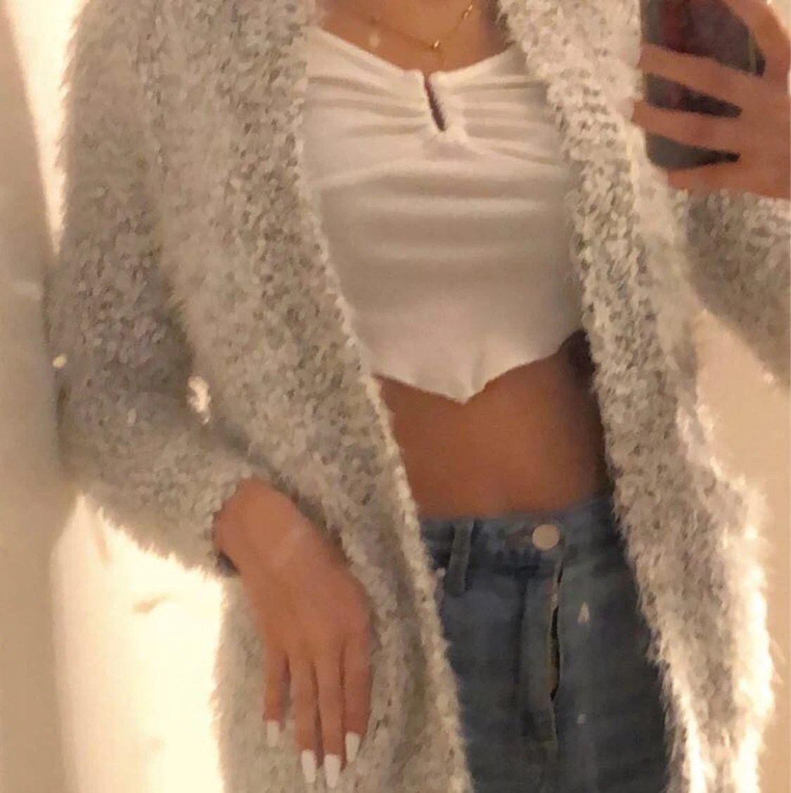 Ljus grå kofta storlek 152