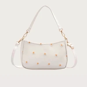 Vit väska med blommor  - Söt vit väska med broderade blommor, har två band så man kan välja att ha den på axeln eller crossbody. Skulle passa super till exempelvis studenten! Frakt kostar 48kr med frimärken eller 51kr spårbar💞