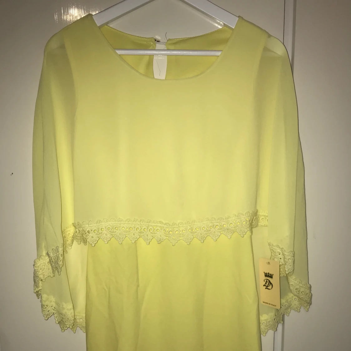 Yellow dress with cape and lace