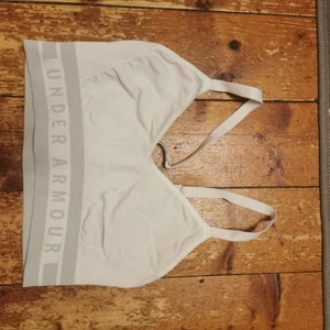 Under Armour sports bra  - White under armour sports bra, size M. 