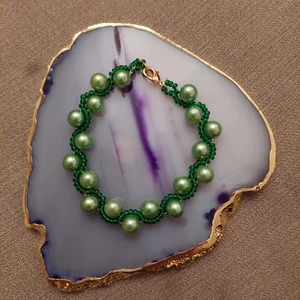 Handgjort pärlarmband - Pärlarmband som jag gjort själv. 20cm lång 