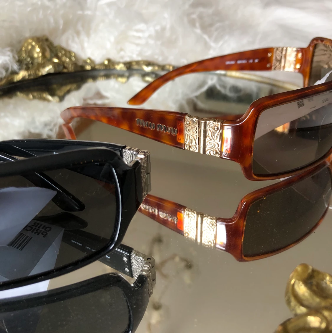 Prada Miumiu solglasögon  - 90