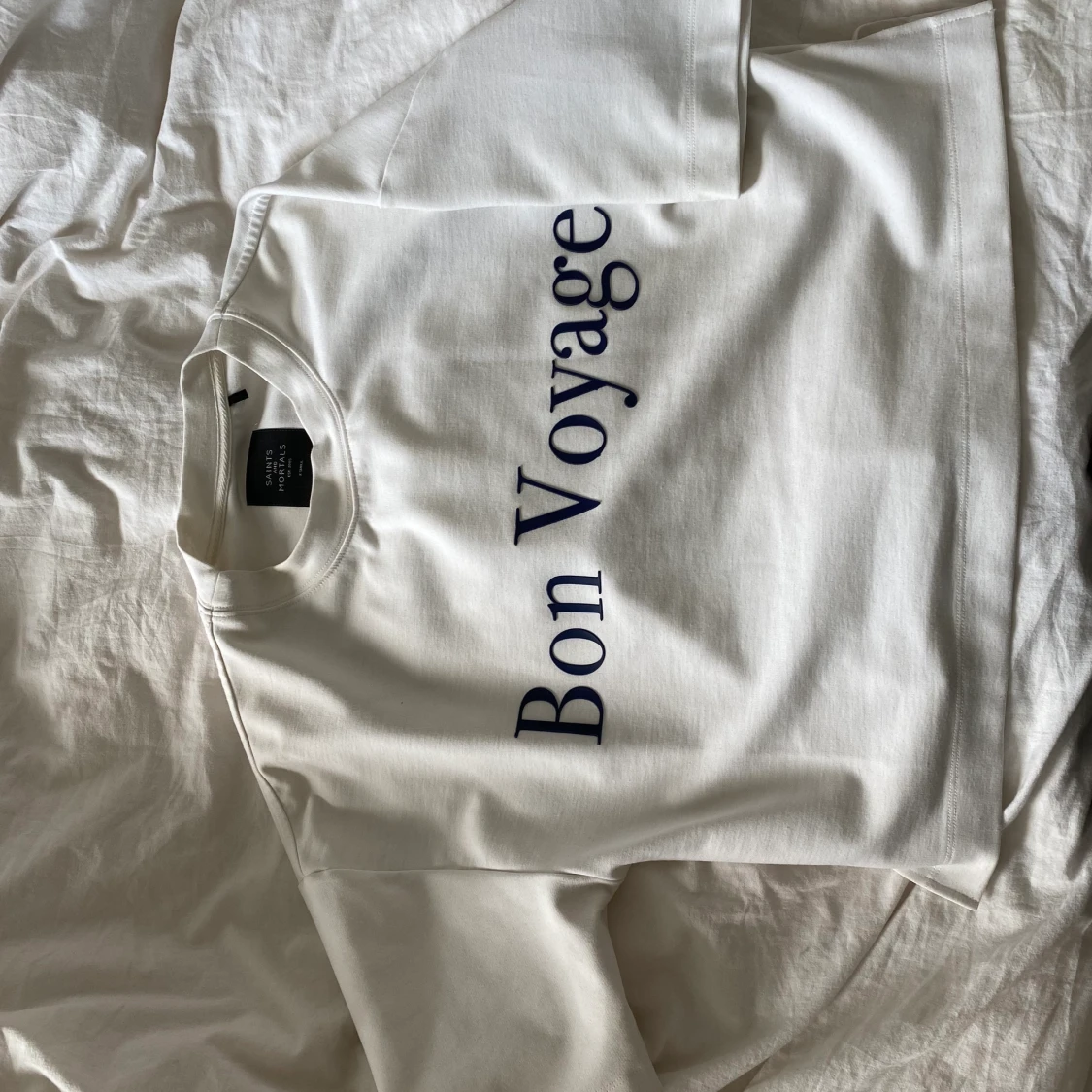 Vit t-shiet med blå text - 90