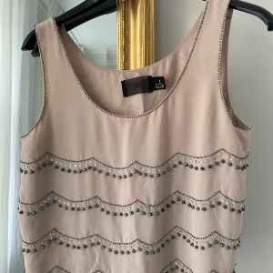 Snyggt linne från hm  - Snyggt kort linne som sitter löst från hm