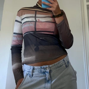 Långärmad mesh topp - Oanvänd mesh topp. Stretchigt materiel som passar de flesta storlekar. 