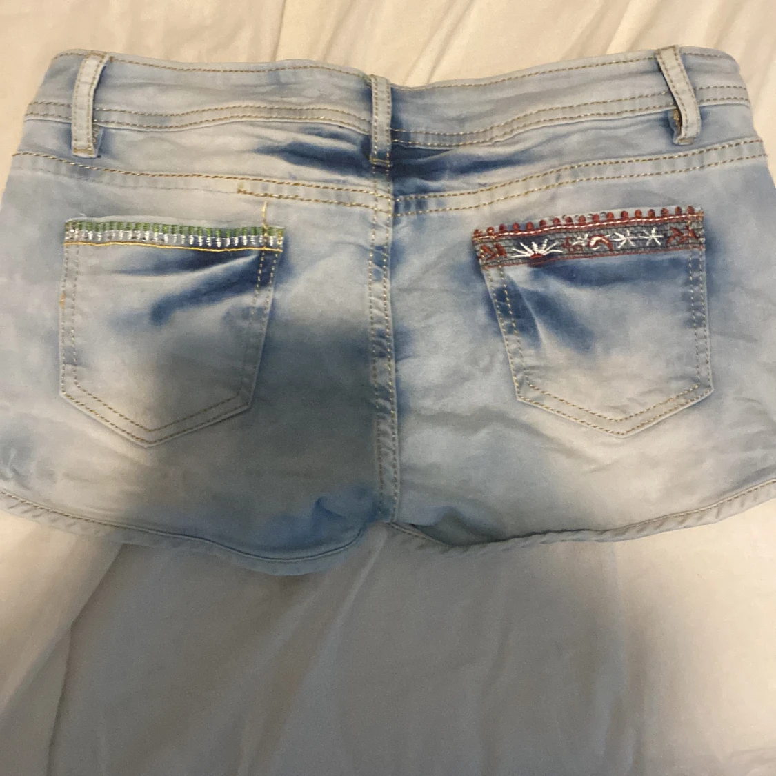 Ett par blåa shorts  - 90